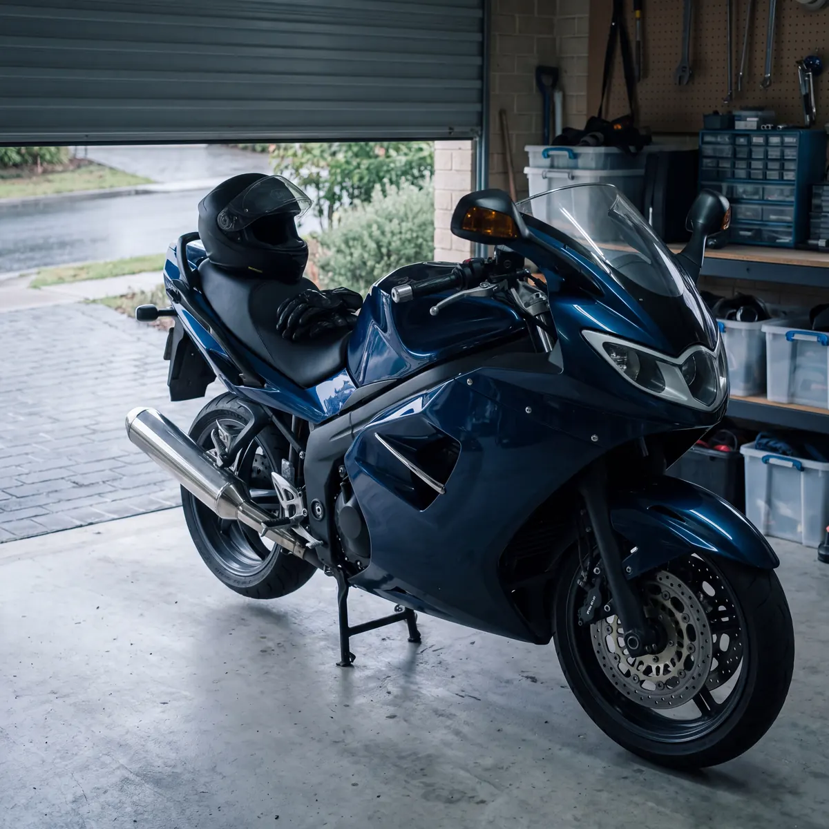 Large sport touring motorbike on its stand in a home garage